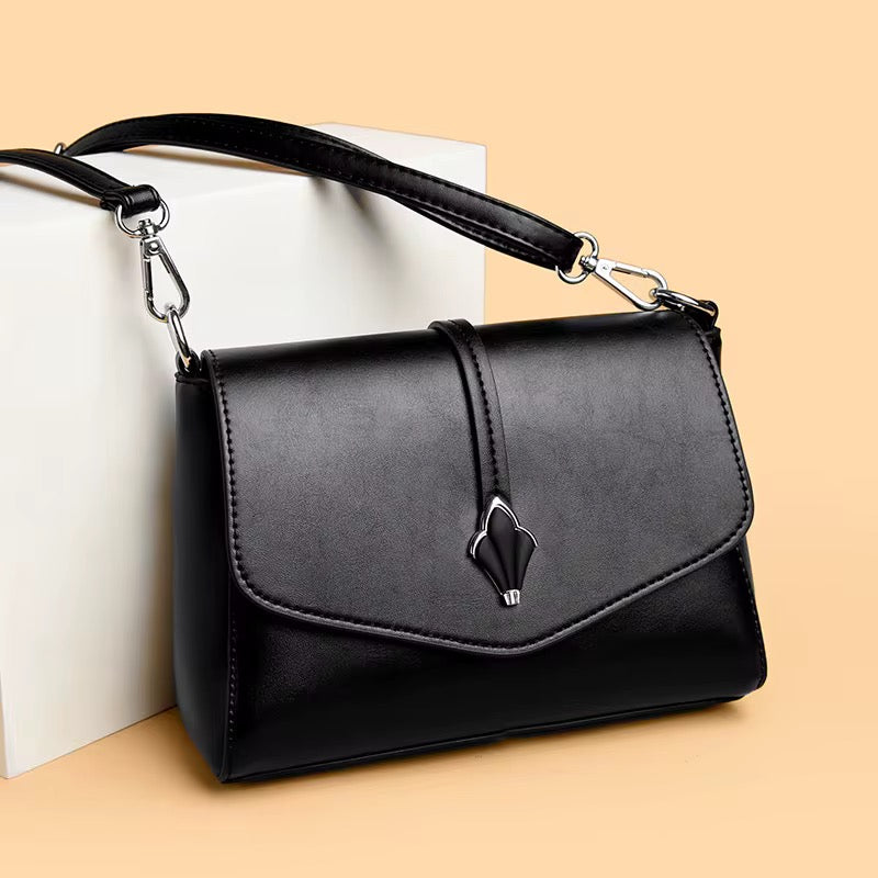 ZYB215 Elegant Teardrop Hardware Flap Bag